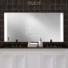 Bathroom vanity double sink mirror TV with integrated LED light.